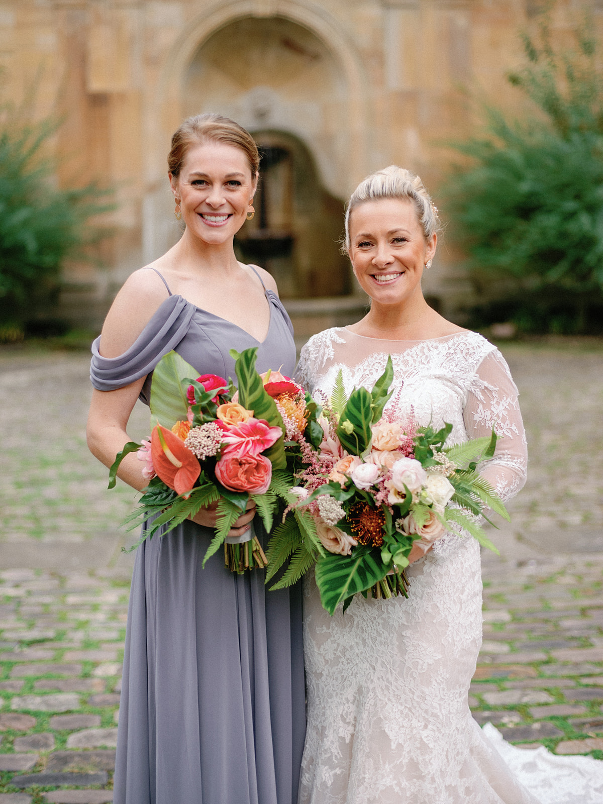 Bride and Sister holding bouquets by HeatherLily