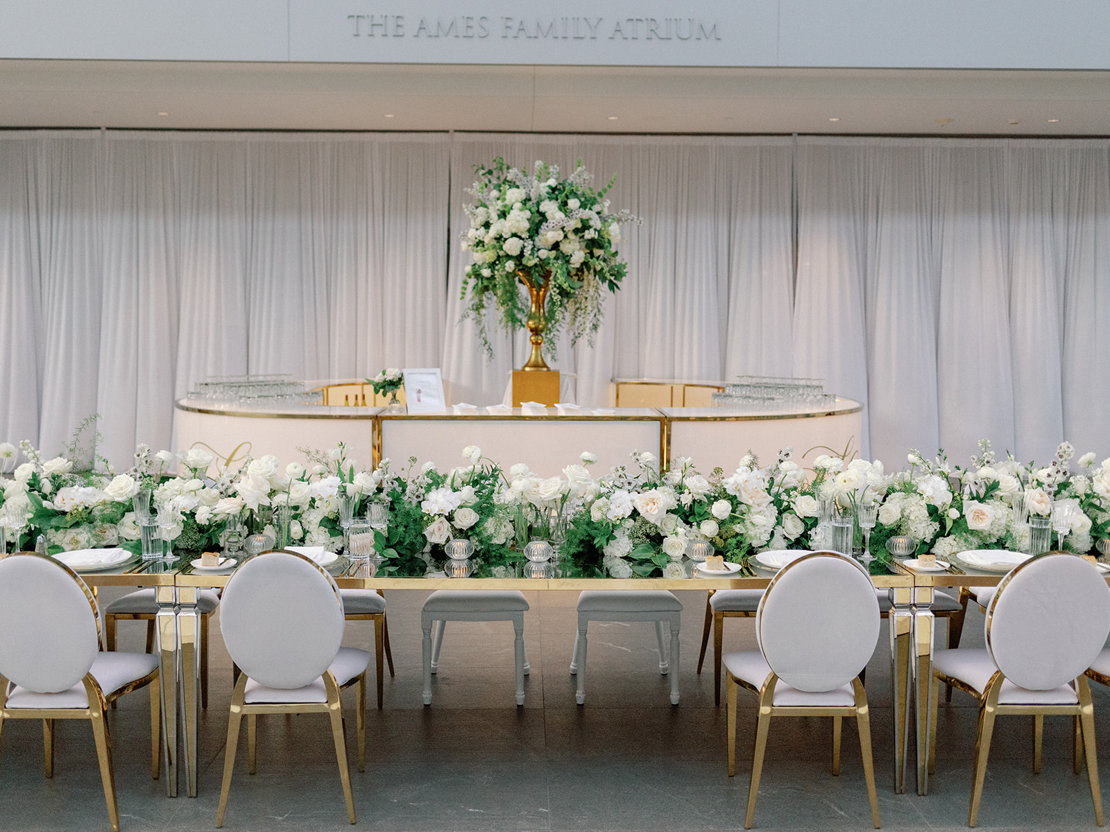 Cleveland Museum of Art, Gold and White Wedding Reception with round bar and beautiful flowers at the Cleveland Museum of Art by HeatherLily