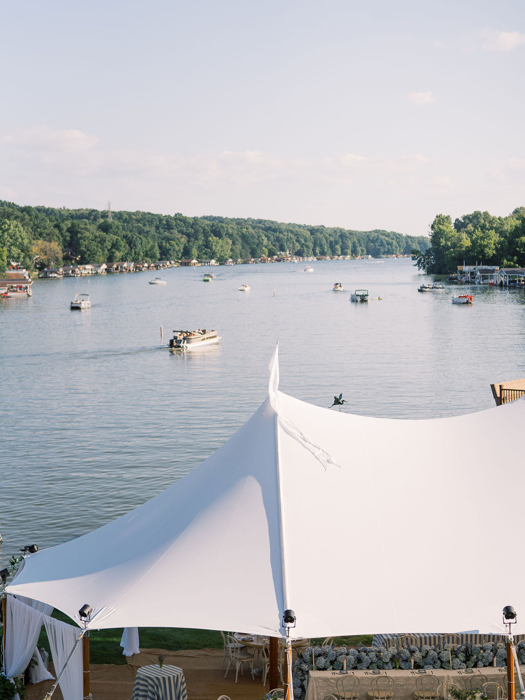 Lake front house wedding with a tent in central Ohio